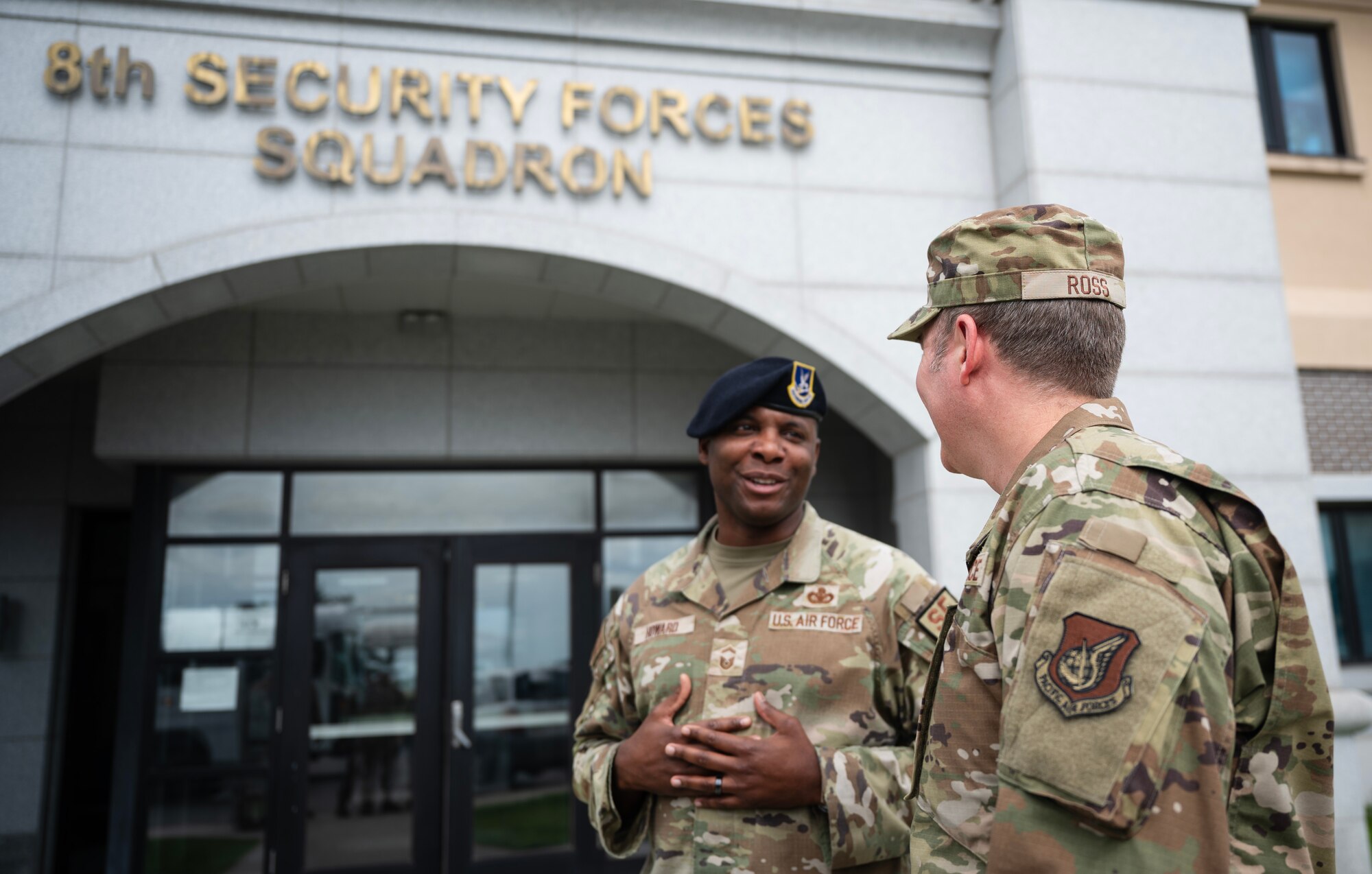 8th Security Forces Squadron plans and programs superintendent, greets the 7th Air Force command chief, during his first immersion tour at Kunsan Air Base