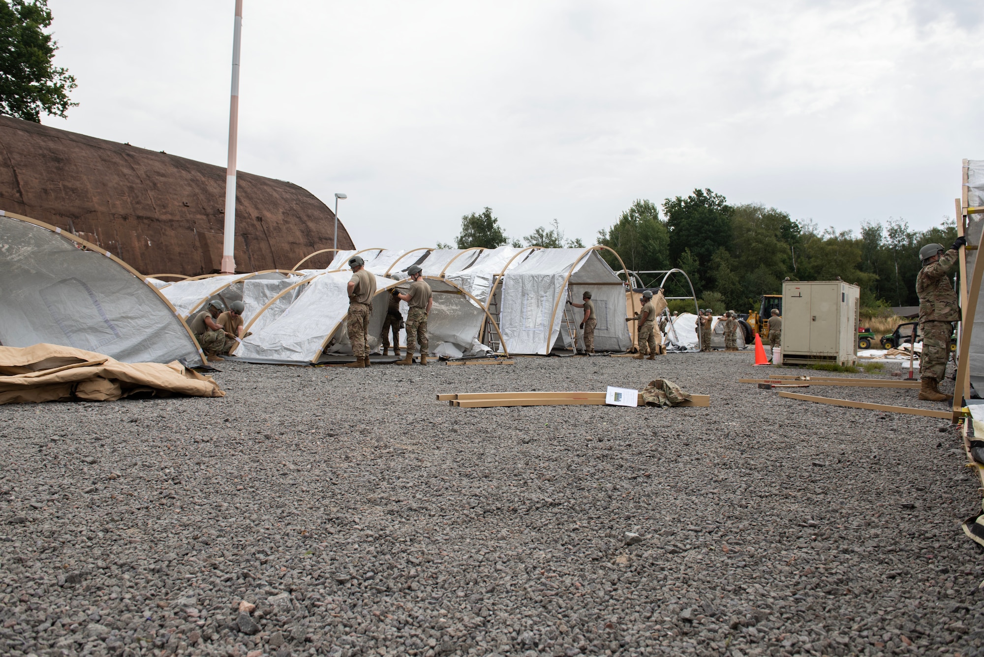 Multiple Airmen sent up tents