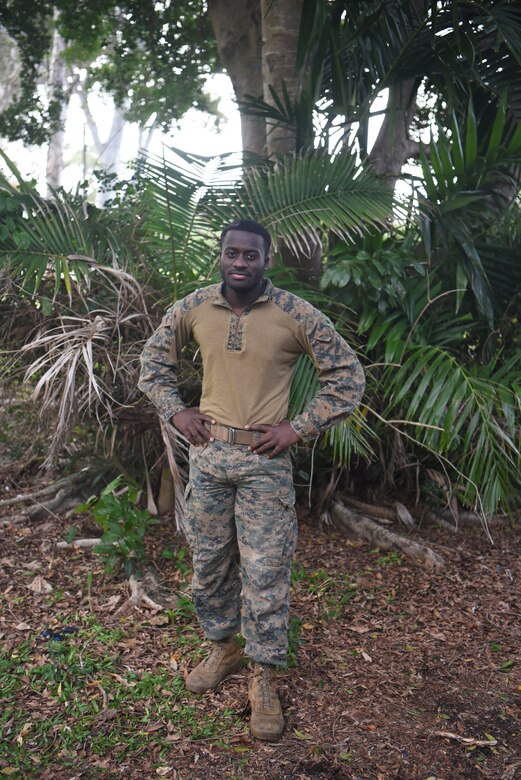A Marine poses for a photo.
