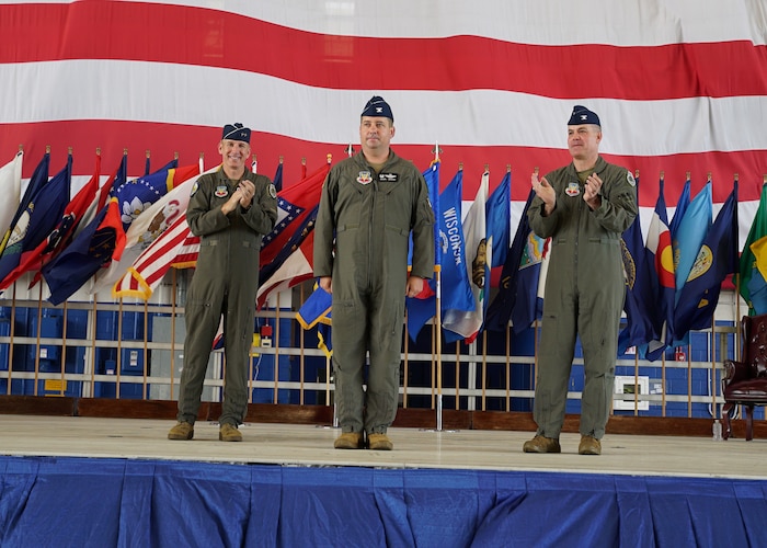 U.S. Air Force Warfare Center commander, Maj. Gen. Case Cunningham and Col. Matthew Bradley, former commander of the 53rd Wing, lead applause for Col. Daniel Lehoski, the new commander of the 53rd Wing, during a change of command ceremony at Eglin Air Force Base, Florida, July. 21, 2023. Lehoski received his commission from Texas A&M University in 2000 and is a command pilot with more than 1,500 hours and has flown in support of Operation NOBLE EAGLE and theater security packages worldwide. (U.S. Air Force photo by Capt. Lindsey Heflin)