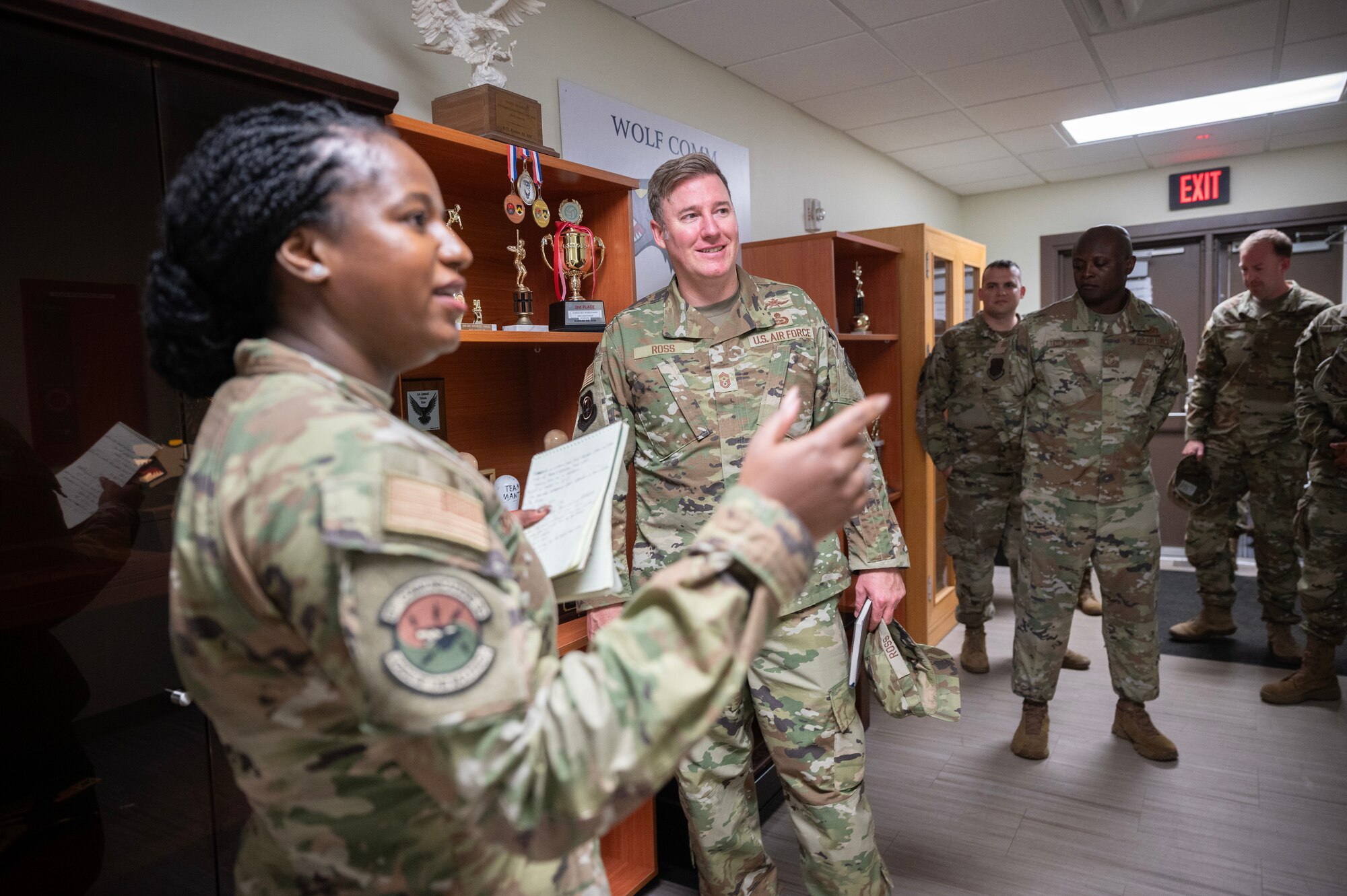 8th Communication Squadron plans and programs section chief, describes wireless network technology displayed on a map for the 7th Air Force command chief, during his first immersion tour at Kunsan Air Base