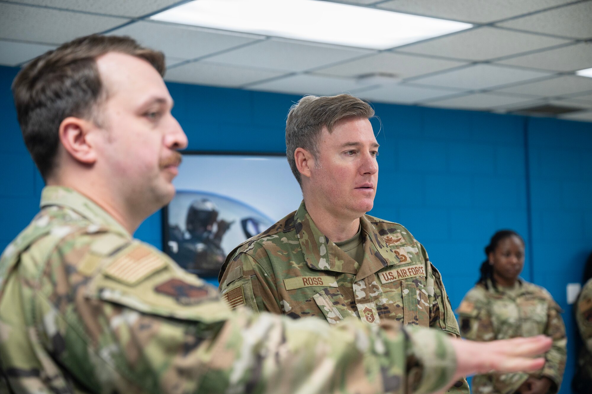 Tech. Sgt. Abel Crowell provides Chief Master Sgt. Jeremiah W. Ross, 7th Air Force command chief, a brief overview of maintenance virtual reality training at Kunsan Air Base