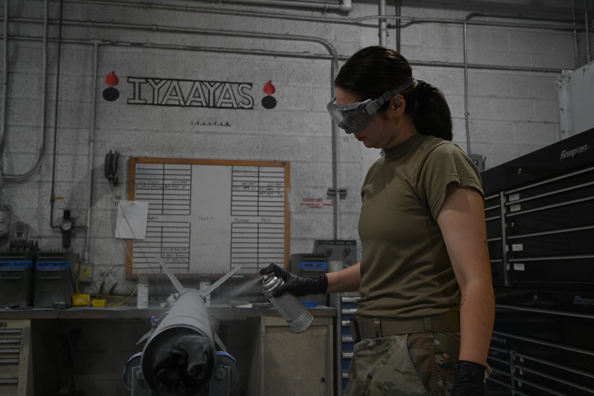 This was part of a weekly maintenance routine that included painting, stencil coating and hangar lubrication for the attachments connecting to the F-15E Strike Eagle. (U.S. Air Force photo by Senior Airman Kylie Barrow)