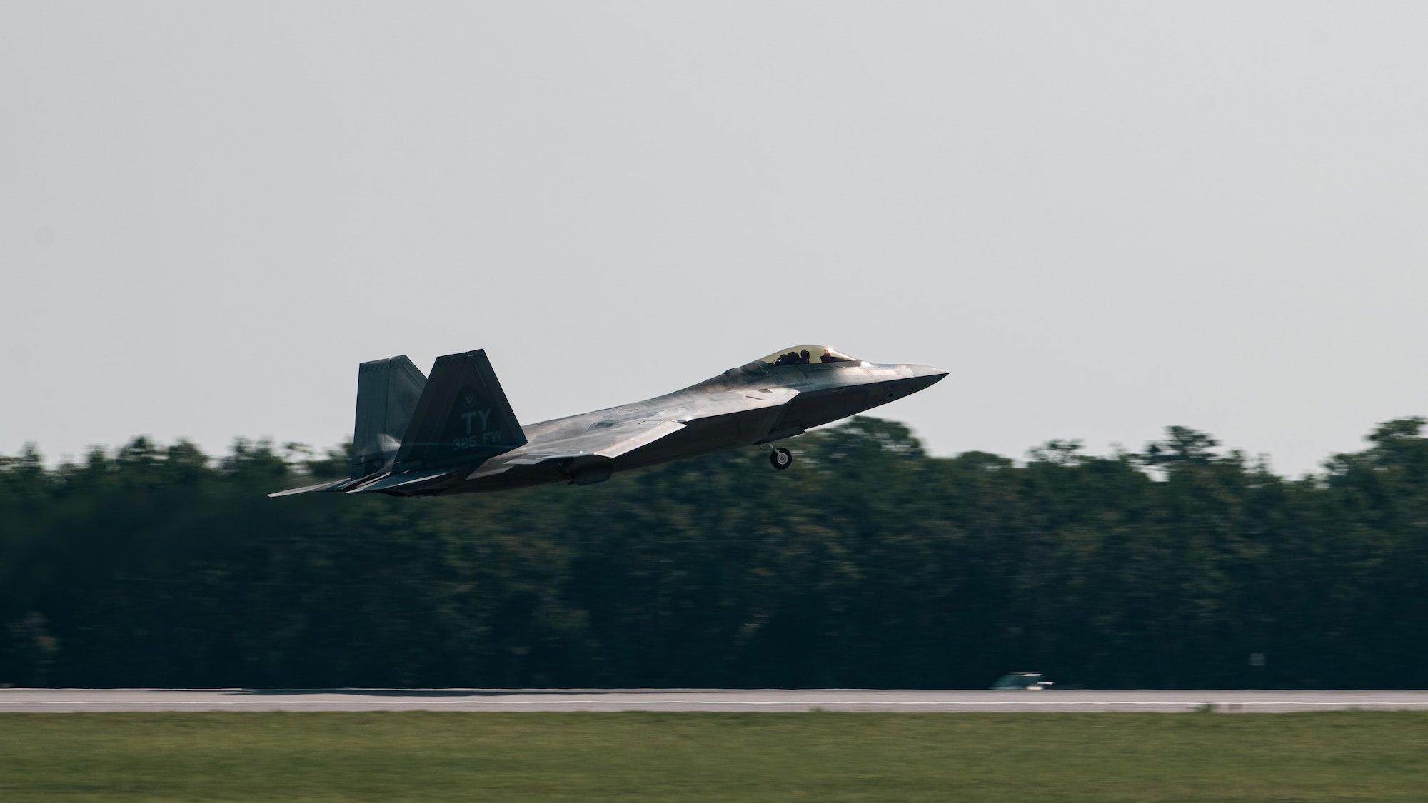 An F-22 Raptor takes off.