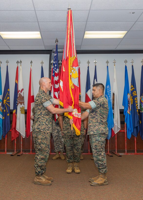 The U.S. Marine Corps Forces, Pacific, Color Guard prepare to present the colors during the Headquarters and Service Battalion Change of Command ceremony at Camp H.M. Smith, Hawaii, July 21, 2023. The change of command ceremony symbolizes the passing of authority between the off-going and on-coming commanding officer. During the ceremony, U.S. Marine Corps Col. Eduardo C. Bitanga II relinquished his duties as commanding officer of HQSVCBN to Col. Mark F. Schaefer. (U.S. Marine Corps photo by Sgt. Danny Nateras)