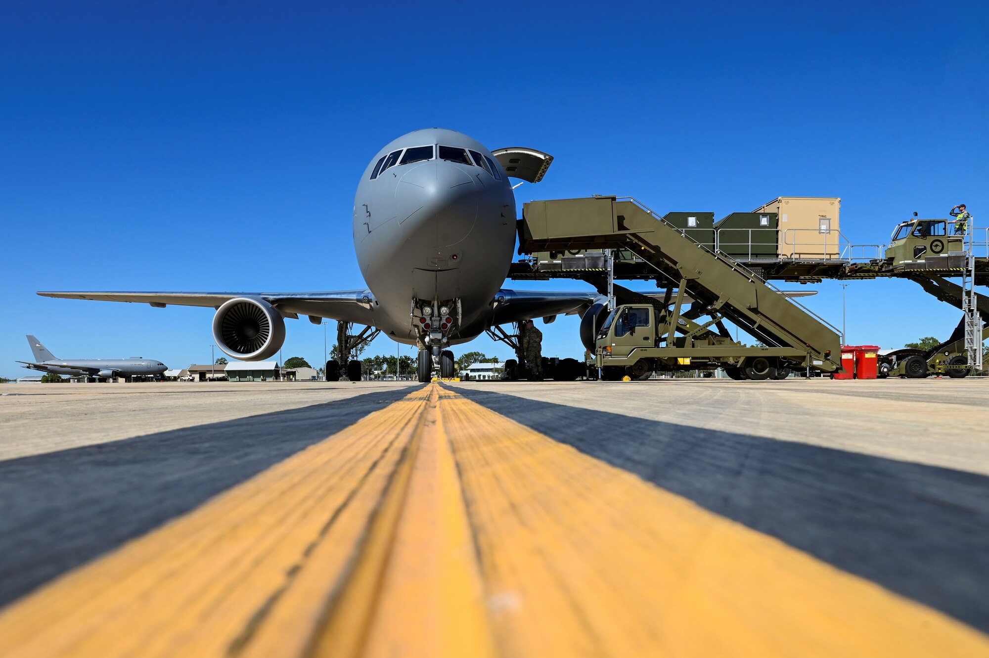 Royal Australian Air Force and 92nd Expeditionary Wing personnel prepare to get multiple KC-46 Pegasus airborne for Mobility Guardian 23 in Darwin, Australia, on July 9, 2023. A multinational endeavor, MG23 featured seven participating countries – Australia, Canada, France, Japan, New Zealand, the United Kingdom, and the United States – operating nearly 70 mobility aircraft across multiple locations spanning a 3,000-mile area in the Indo-Pacific. (U.S. Air Force photo by Airman 1st Class Haiden Morris)