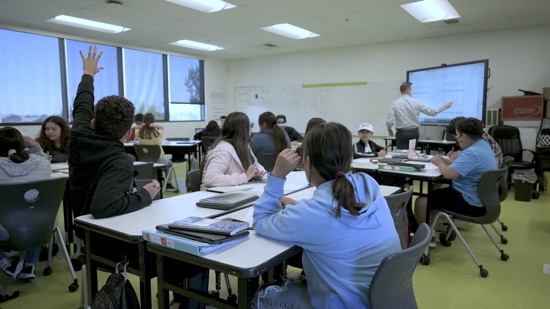 Matthew Winheim, Palmdale School District STEM and mathematics educator, teaches a lesson to students in the PRIME program. The voluntary STEM program has dozens of students apply and enroll in the class, demonstrating their eagerness to participate.