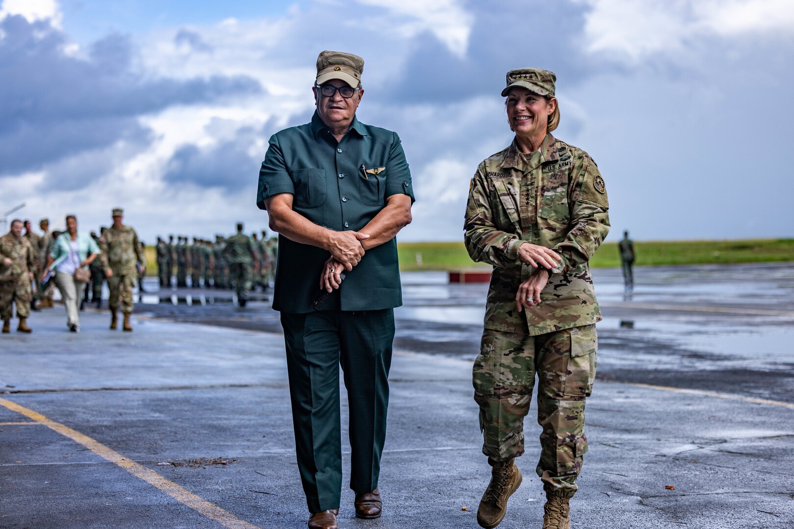 U.S. Southern Command (SOUTHCOM) Commander, Gen. Laura Richardson (right) and Gerry Gouveia, Guyana national security advisor, walk together at the distinguished visitor day during TRADEWINDS 23 at Air Base London, Guyana, July 26, 2023.