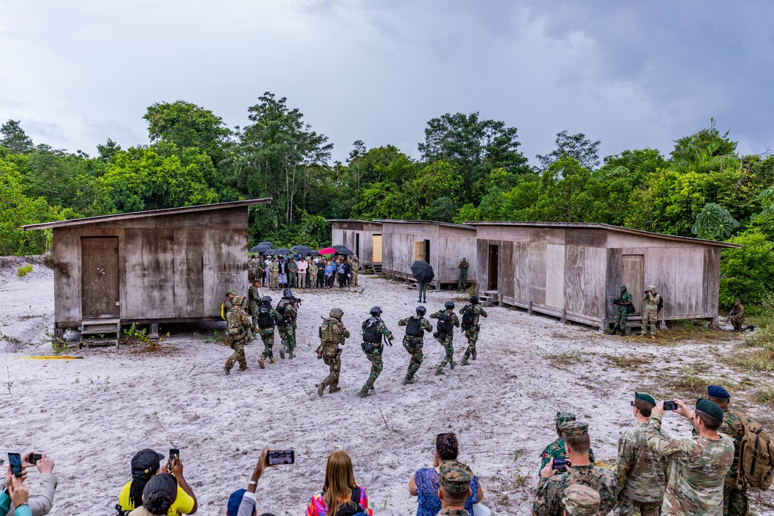 Guyana leadership and foreign dignitaries receive a live, mock display of the operations of TRADEWINDS 23 at Camp Stephenson, Guyana, July 26, 2023.