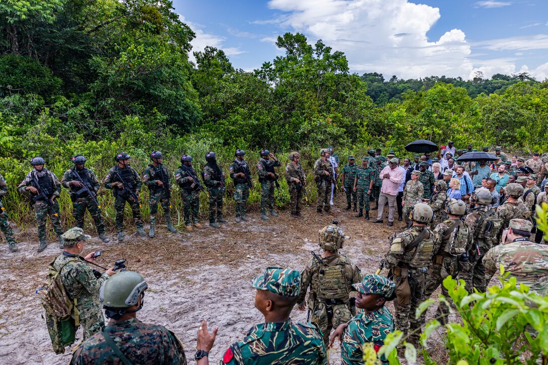 Guyana leadership and foreign dignitaries speak to participants of TRADEWINDS 23 at Camp Stephenson, Guyana, July 26, 2023.
