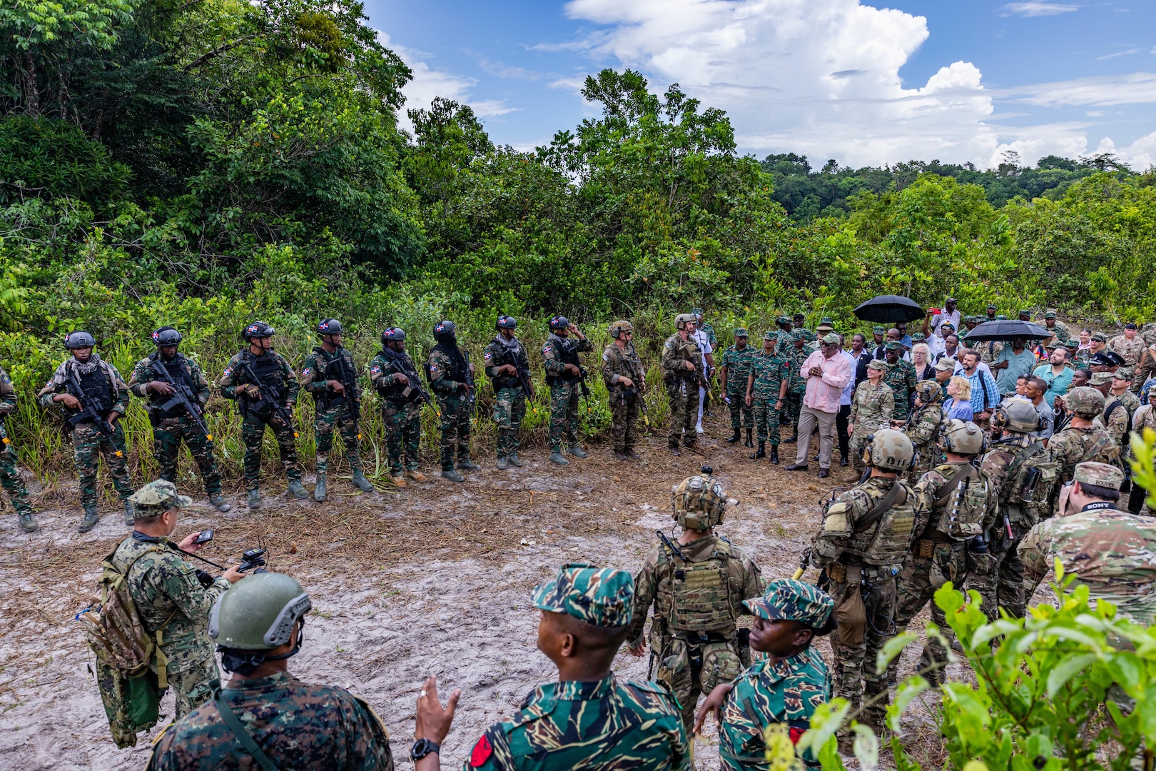 Guyana leadership and foreign dignitaries speak to participants of TRADEWINDS 23 at Camp Stephenson, Guyana, July 26, 2023.