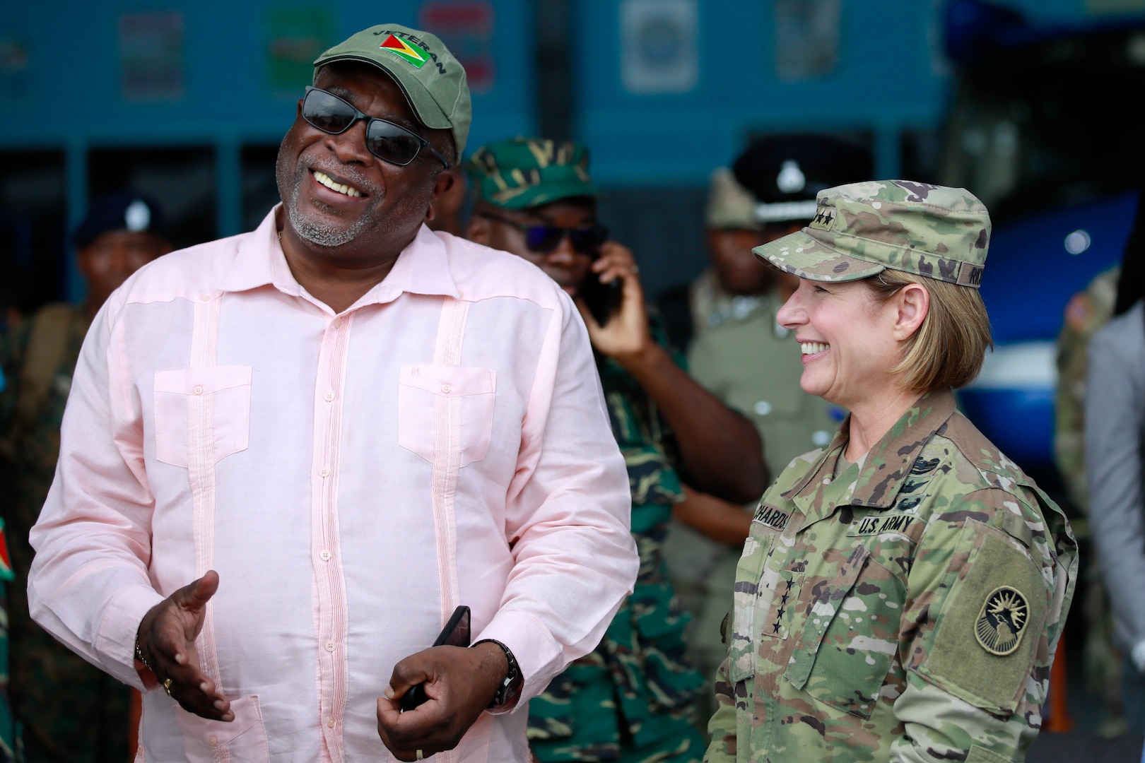Guyana Prime Minister, Mark Phillips speaks with U.S. Army Gen. Laura Richardson during a reception for distinguished visitor day at Air Base London, Guyana on July 26, 2023.