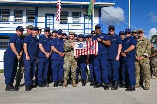 U.S. Coast Guard members pose for a group photo with Gen. Laura Richardson, commander, U.S. Southern Command, during Tradewinds 2023, July 26, 2023, in Georgetown, Guyana.