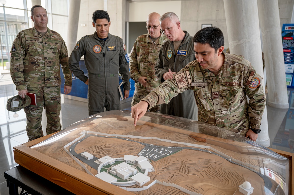 U.S. Air Force Col. Matt McKinney, Resolute Sentinel 23 Combined Joint Task Force Commander, and Fuerza Aérea del Perú Col. Fidel Castro, Resolute Sentinel 23 CJTF Deputy Commander, conduct a tour at the Centro Nacional de Operaciones de Imágenes Satelitales, Lima, Peru, July 4, 2023, as part of Resolute Sentinel 23. The space exercise, led by U.S. Southern Command in partnership with U.S. Space Command’s Joint Task Force Space Defense Commercial Operations (JCO) Cell, the Peruvian Aerospace Research and Development Center (CONIDA), and the Peruvian Air Force, aims to bolster the region's emerging space programs.  (U.S. Air Force photo by Staff Sgt. Matthew Matlock)