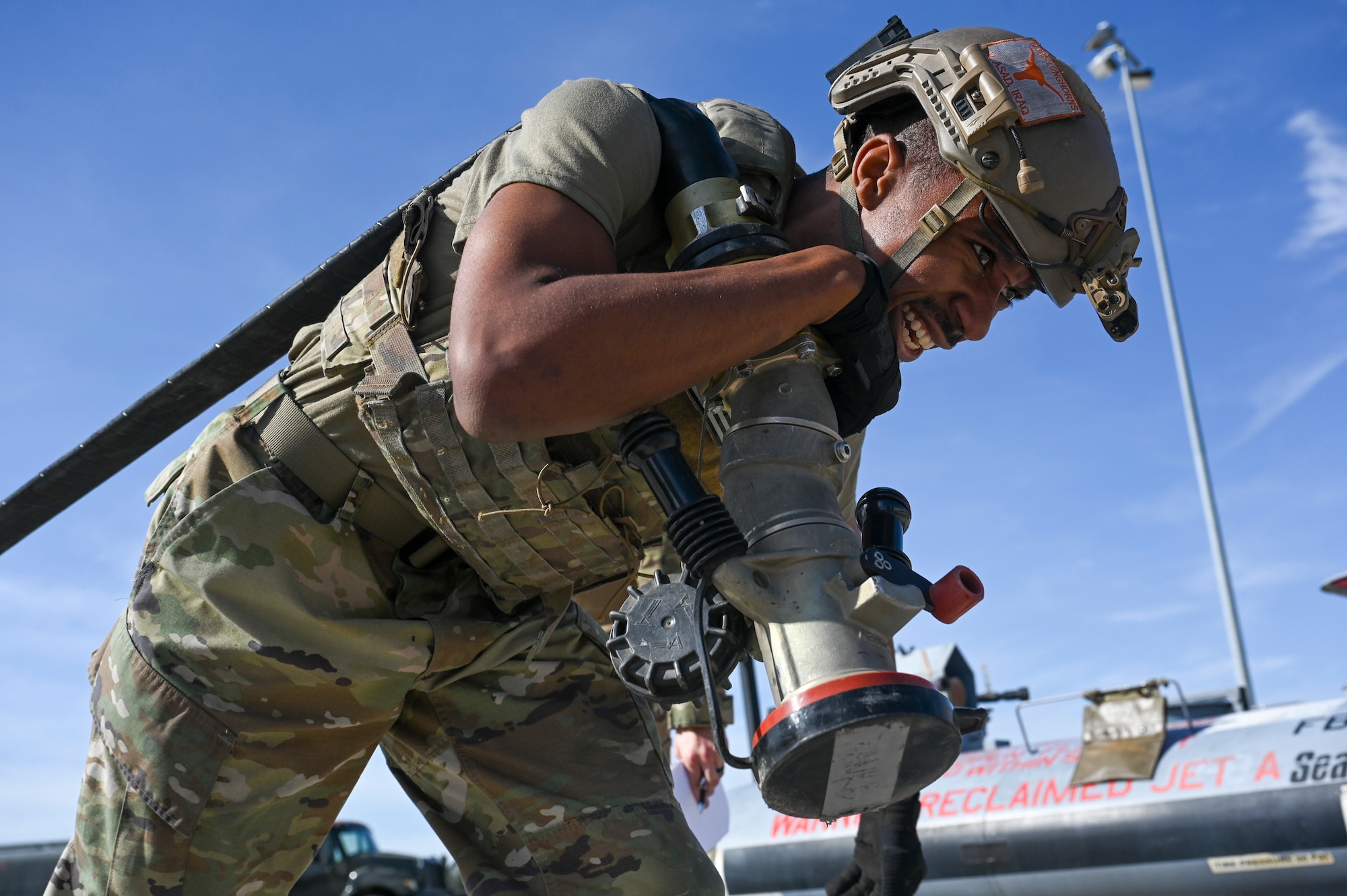 U.S. Air Force 1st Lt. Jared Mitchell, 355th Logistics Readiness Squadron Fuels Management Flight Commander, pulls a 300-foot fuel hose during a forward area refueling point team tryout at Davis-Monthan Air Force Base, Ariz., July 28, 2023. There were only 63 FARP team positions across the Air Force, nine at each of the seven bases with a program.
