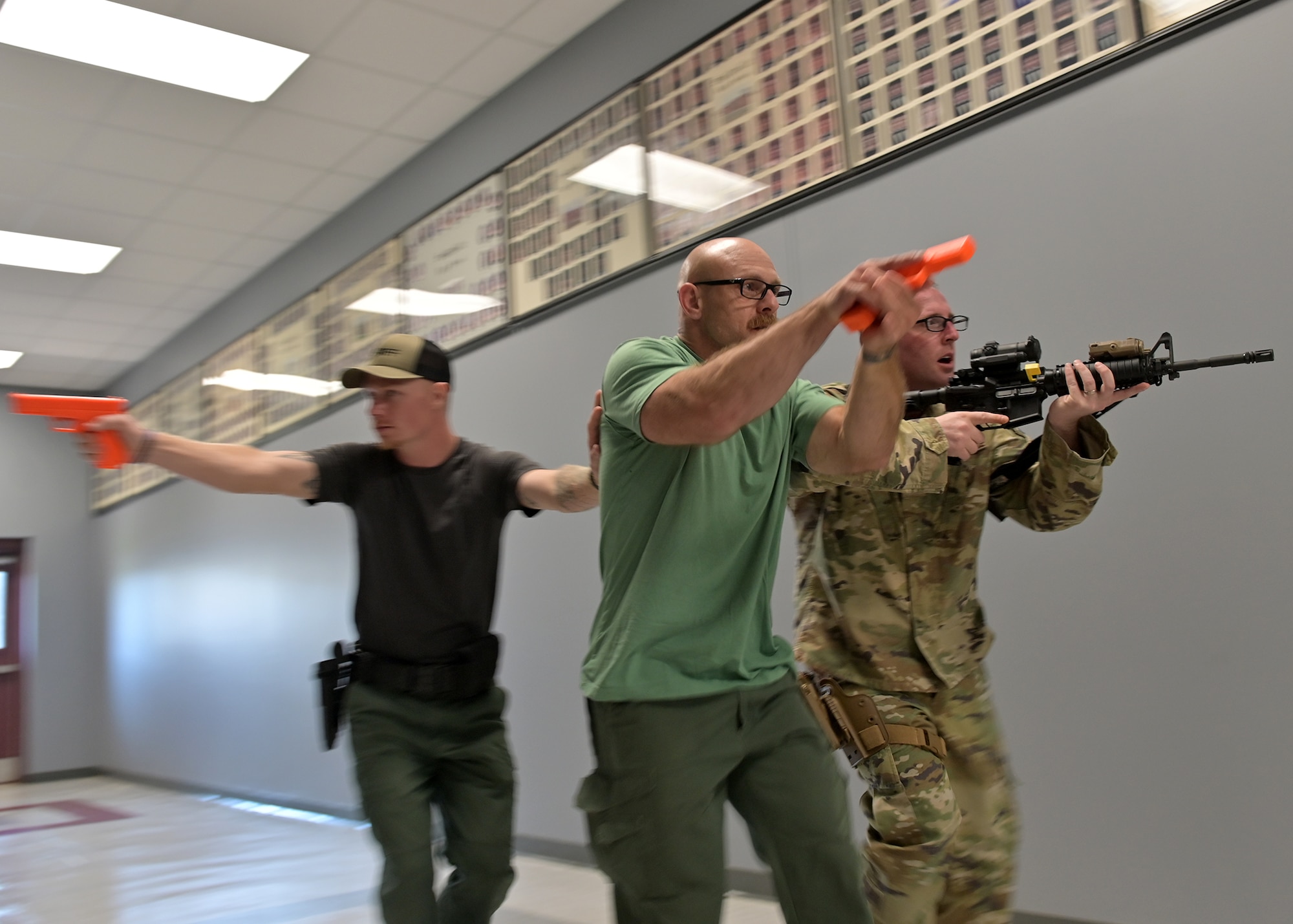 A group of ALERRT participants practice tactical movements.