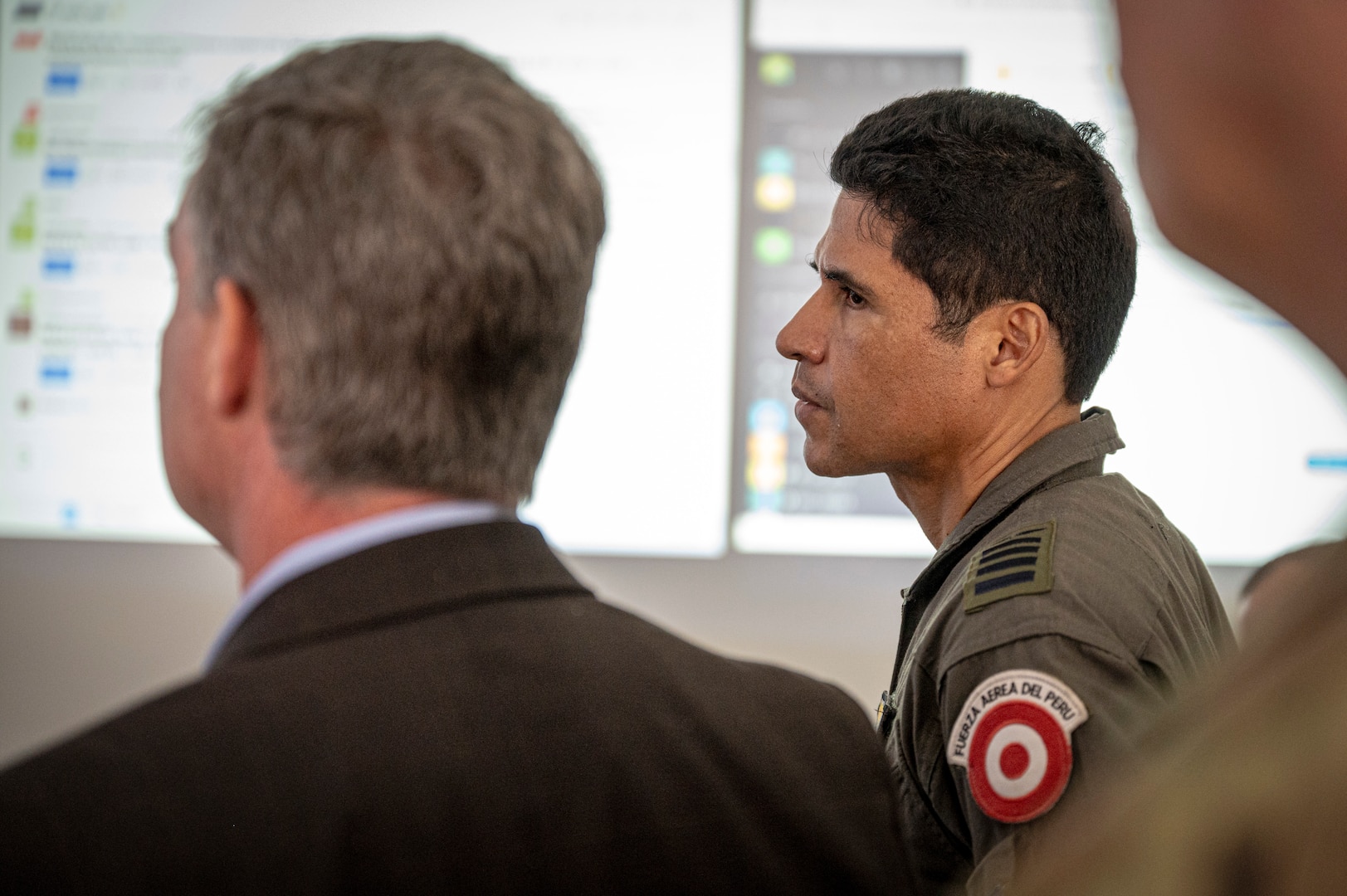 U.S. Air Force Col. Matt McKinney, Resolute Sentinel 23 Combined Joint Task Force Commander, and Fuerza Aérea del Perú Col. Fidel Castro, Resolute Sentinel 23 CJTF Deputy Commander, conduct a tour at the Centro Nacional de Operaciones de Imágenes Satelitales, Lima, Peru, July 4, 2023, as part of Resolute Sentinel 23. The space exercise, led by U.S. Southern Command in partnership with U.S. Space Command’s Joint Task Force Space Defense Commercial Operations (JCO) Cell, the Peruvian Aerospace Research and Development Center (CONIDA), and the Peruvian Air Force, aims to bolster the region's emerging space programs.  (U.S. Air Force photo by Staff Sgt. Matthew Matlock)