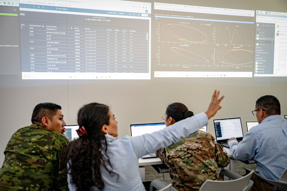 U.S. Air Force Col. Matt McKinney, Resolute Sentinel 23 Combined Joint Task Force Commander, and Fuerza Aérea del Perú Col. Fidel Castro, Resolute Sentinel 23 CJTF Deputy Commander, conduct a tour at the Centro Nacional de Operaciones de Imágenes Satelitales, Lima, Peru, July 4, 2023, as part of Resolute Sentinel 23. The space exercise, led by U.S. Southern Command in partnership with U.S. Space Command’s Joint Task Force Space Defense Commercial Operations (JCO) Cell, the Peruvian Aerospace Research and Development Center (CONIDA), and the Peruvian Air Force, aims to bolster the region's emerging space programs.  (U.S. Air Force photo by Staff Sgt. Matthew Matlock)