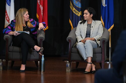 Under Secretary of Commerce for Intellectual Property and Director of the U.S. Patent and Trademark Office Kathi Vidal speaks with Liseth Velez, Boston Ambassador for Bunker Labs, and military veteran entrepreneur, during an Entrepreneurship Essentials Workshop panel at Hanscom Air Force Base, Mass., July 28. The workshop and resource fair aimed to connect military spouses, veterans, and transitioning service members with the tools and information needed to begin a small business. (U.S. Air Force photo by Todd Maki)