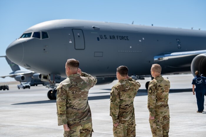 leadership salutes an aircraft