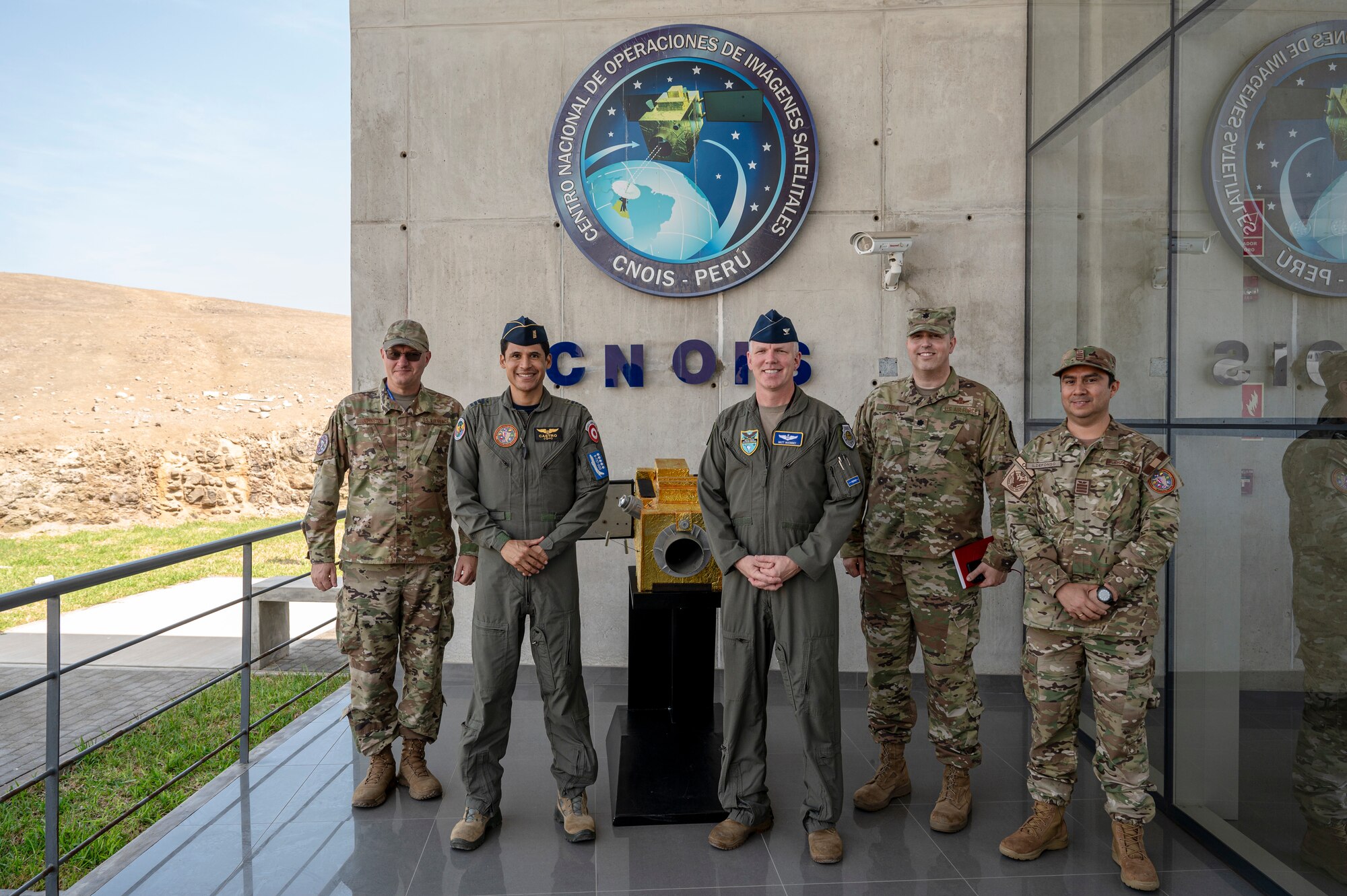 U.S. Air Force Col. Matt McKinney, Resolute Sentinel 23 Combined Joint Task Force Commander, and Fuerza Aérea del Perú Col. Fidel Castro, Resolute Sentinel 23 CJTF Deputy Commander, conduct a tour at the Centro Nacional de Operaciones de Imágenes Satelitales, Lima, Peru, July 4, 2023, as part of Resolute Sentinel 23. The space exercise, led by U.S. Southern Command in partnership with U.S. Space Command’s Joint Task Force Space Defense Commercial Operations (JCO) Cell, the Peruvian Aerospace Research and Development Center (CONIDA), and the Peruvian Air Force, aims to bolster the region's emerging space programs.  (U.S. Air Force photo by Staff Sgt. Matthew Matlock)