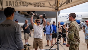 Special Warfare Training Wing Airmen from Joint Base San Antonio displayed tools of the trade at their booth, plus standard physical fitness assessments for about 600,000 attendees at the Experimental Aircraft Association Oshkosh AirVenture in Oshkosh, Wisconsin, July 24-30.