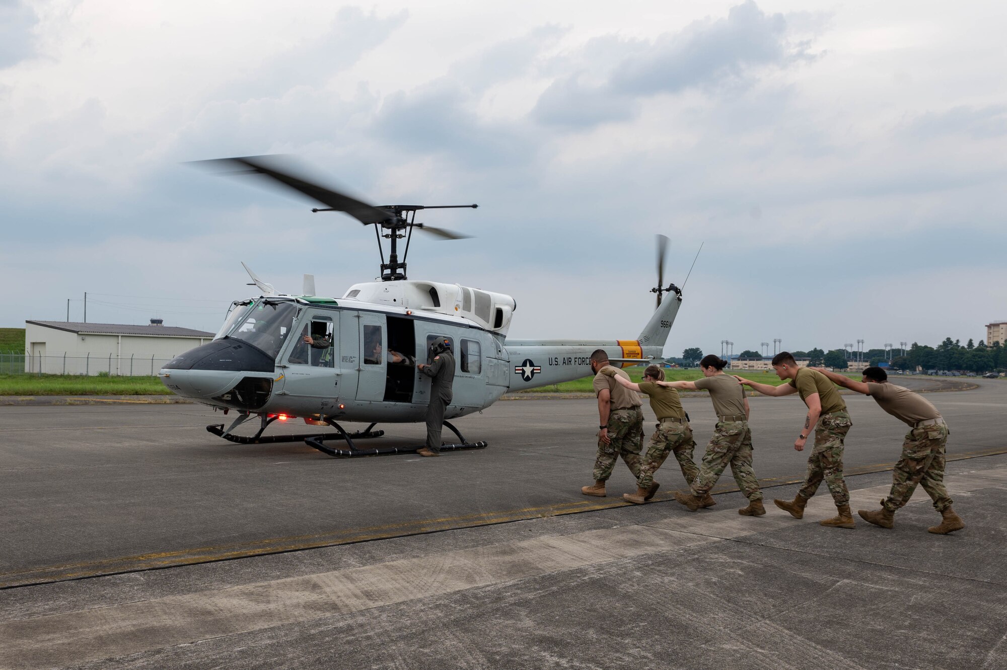 Airmen assigned to the 374th Medical Group participate in an en route patient staging system training.