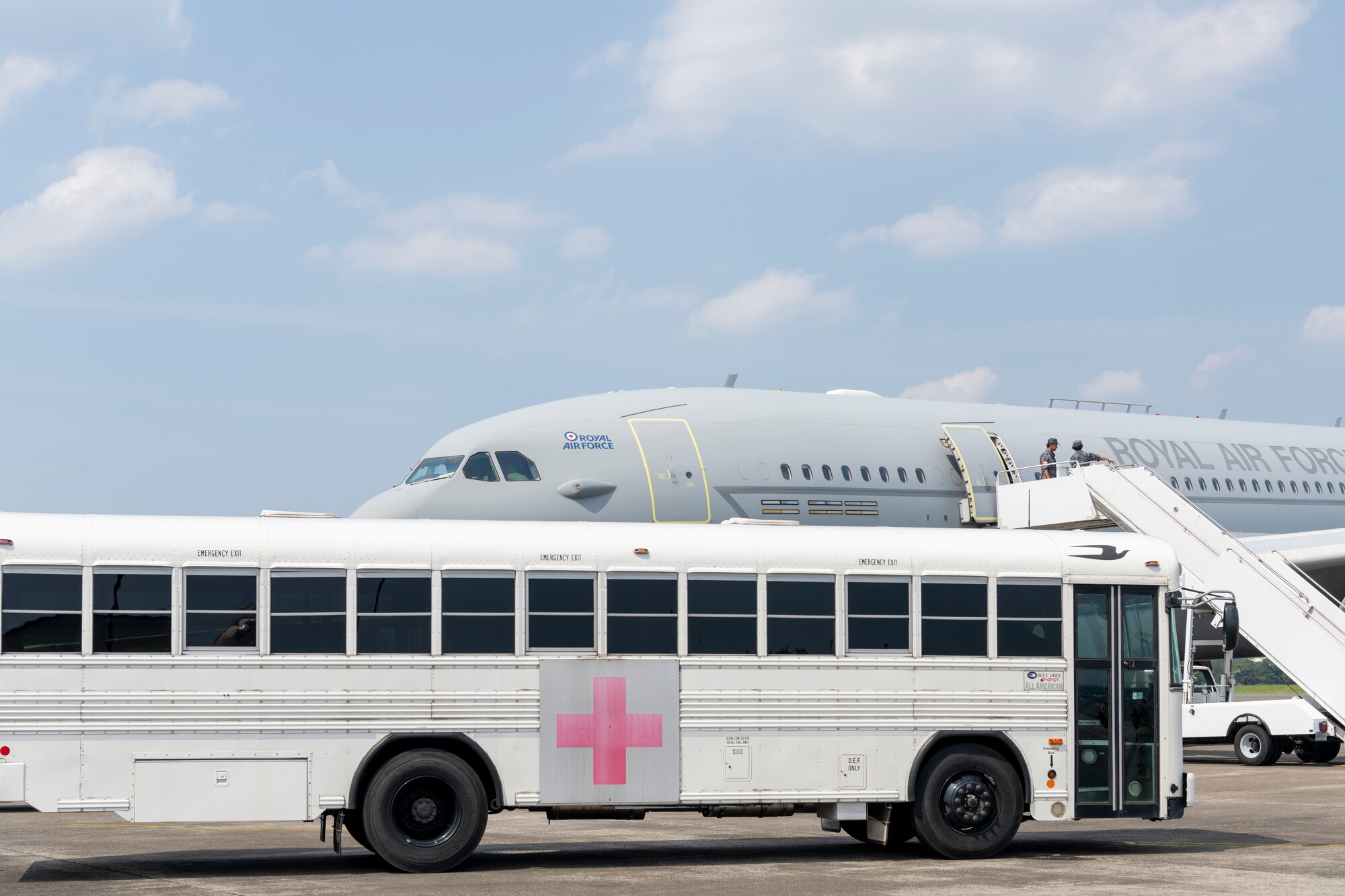 A medical transport bus waits to transport patients.