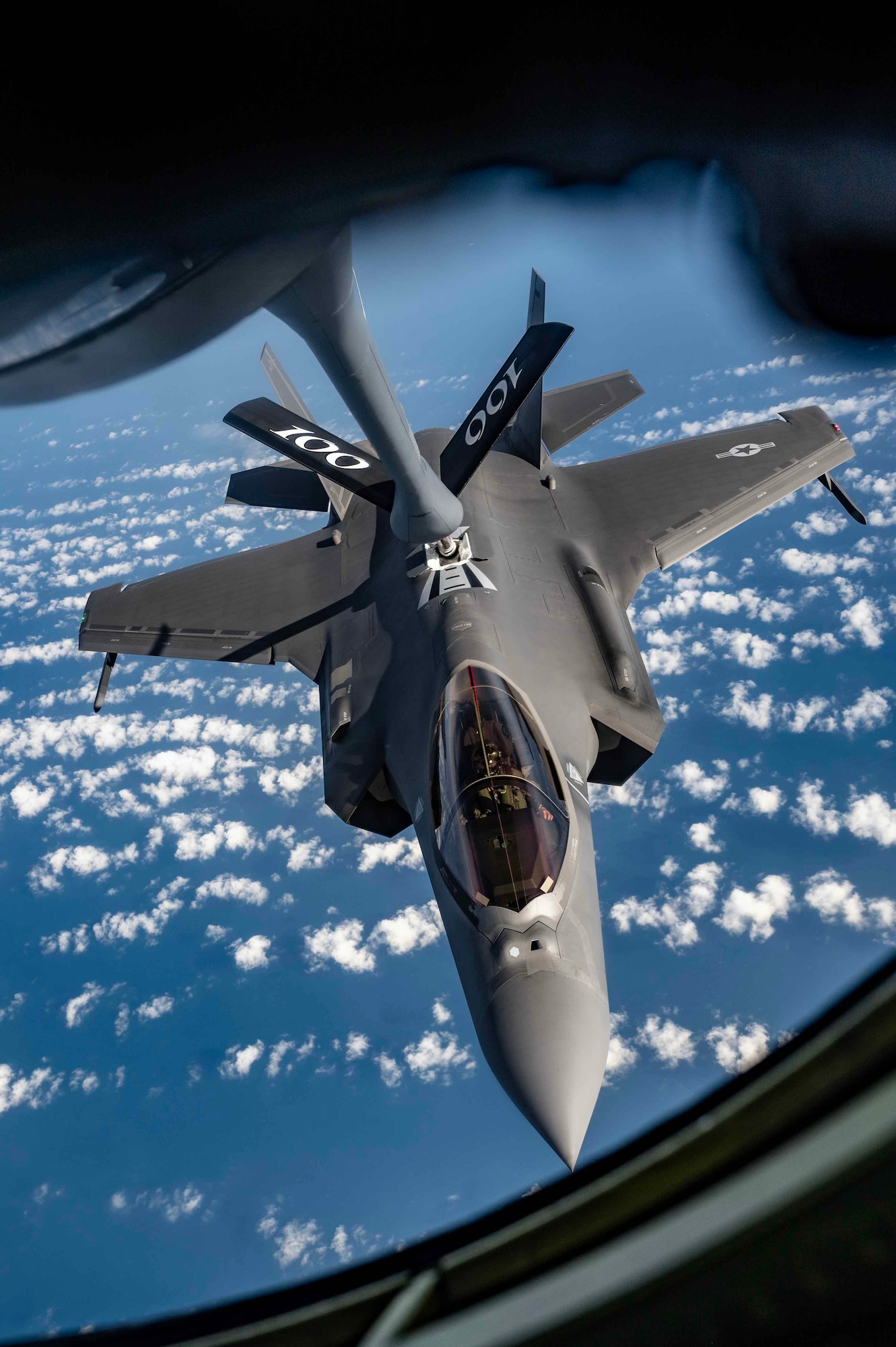 A U.S. Air Force F-35A Lightning II aircraft assigned to Hill Air Force Base, Utah, prepares to be refueled by a KC-135 Stratotanker aircraft from the 100th Air Refueling Wing, Royal Air Force Mildenhall, England, July 25, 2023.