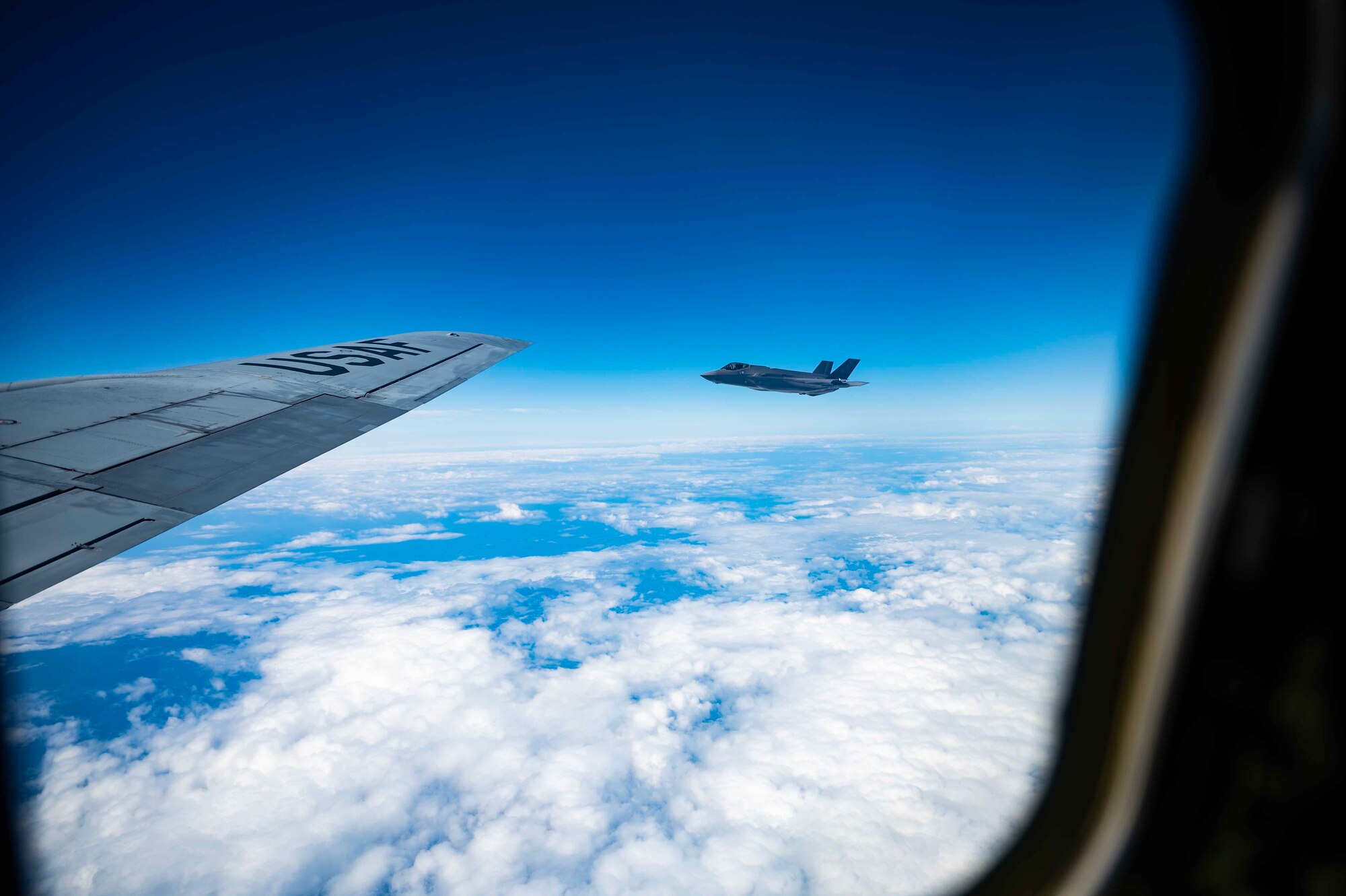A U.S. Air Force F-35A Lightning II aircraft assigned to the 388th Fighter Wing, Hill Air Force Base, Utah, prepares to be refueled by a KC-135 Stratotanker aircraft from the 100th Air Refueling Wing, Royal Air Force Mildenhall, England, July 27, 2023.