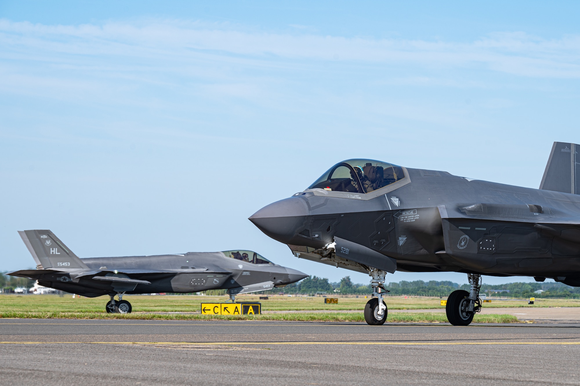 U.S. Air Force F-35A Lightning II aircraft assigned to the 388th Fighter Wing, Hill Air Force Base, Utah, taxi on the flightline prior to a coronet line at Royal Air Force Mildenhall, England, July 26, 2023.