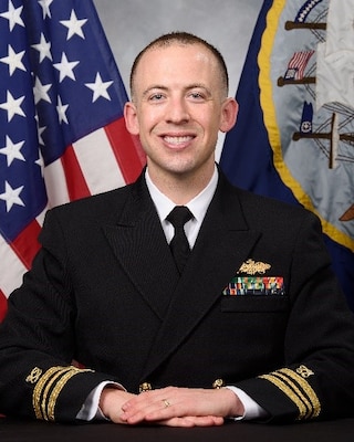 221216-N-UQ872-1002 Port Hueneme, Calf. (Dec. 16, 2022) Official portrait of Lt. Cmdr. John S. McCary. (U.S. Navy photo)