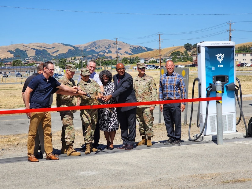 Parks Reserve Forces Training Area leadership and personnel, staff from Army Reserve Installation Management Directorate, and technical partners cut a ribbon to commemorate the installation of seven electric vehicle dual port charging stations on the installation.