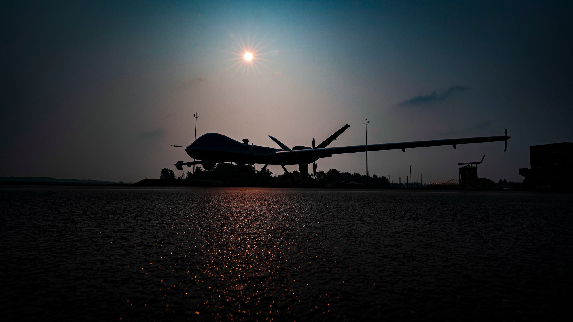 An MQ-9 Reaper, assigned to the 491st Attack Squadron, can be seen on the flightline at Hancock Field Air National Guard Base, New York, June 29, 2023. The 491st ATKS is responsible for assisting the Air National Guard at Hancock in producing approximately 66 aircrew per year, ensuring combat-ready Airmen are capable of piloting MQ-9s. (U.S. Air Force photo by Airman 1st Class Isaiah Pedrazzini)