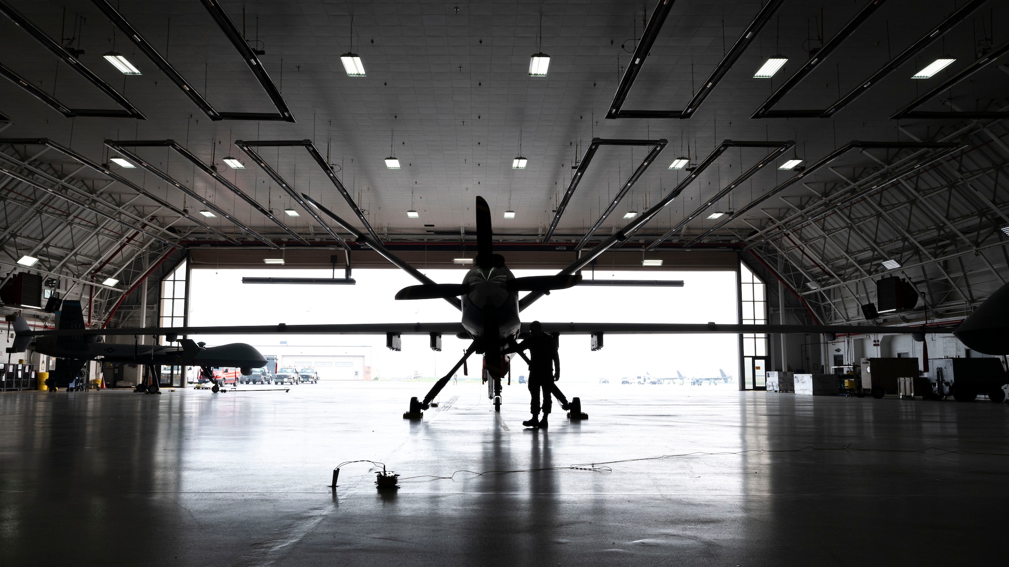 U.S. Air Force Airman 1st Class Koby Davis, 174th Attack Wing crew chief, inspects an MQ-9 Reaper at Hancock Field Air National Guard Base, New York, June 29, 2023. The 491st ATKS is responsible for assisting the Air National Guard at Hancock in producing approximately 66 aircrew per year, ensuring combat-ready Airmen are capable of piloting MQ-9s. (U.S. Air Force photo by Airman 1st Class Isaiah Pedrazzini