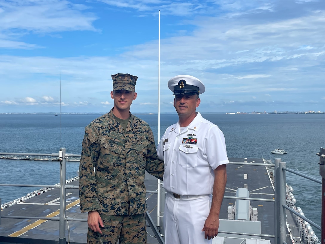 Jordan Orbich and Joshua Orbich pose for a photo aboard the USS Bataan (LHD 5) (Courtesy Photo of Jordan Orbich)