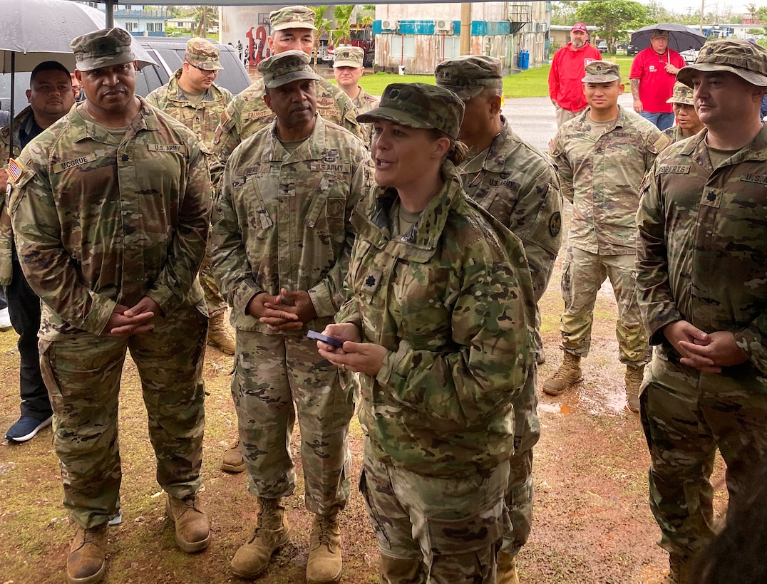 Lt. Col. Chelsey O’Nan, senior U.S. Army Corps of Engineers representative assisting with recovery efforts on Guam, makes comments following the completion of the final metal roof installation by Task Force RISEUP in response to Typhoon Mawar at the recipient’s home in Dededo, Guam July 27. The U.S. Department of Defense and the U.S. Army Corps of Engineers, in coordination with the Federal Emergency Management Agency and the U.S. Territory of Guam, launched the Roofing Installation Support Emergency Utilization Program, or RISEUP, to help temporarily repair metal roofs damaged by Typhoon Mawar, which made landfall May 24.