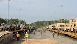 Soldiers from the 29th Infantry Brigade Combat Team conduct rail operations on tactical vehicles transported from Hawaii at Fort Johnson, Louisiana, July 10, 2023. Brigade combat teams and security force assistance brigades conduct simulated large-scale combat operations against near-peer threats at the Joint Readiness Training Center and Fort Johnson to increase readiness and support globally deployable missions.