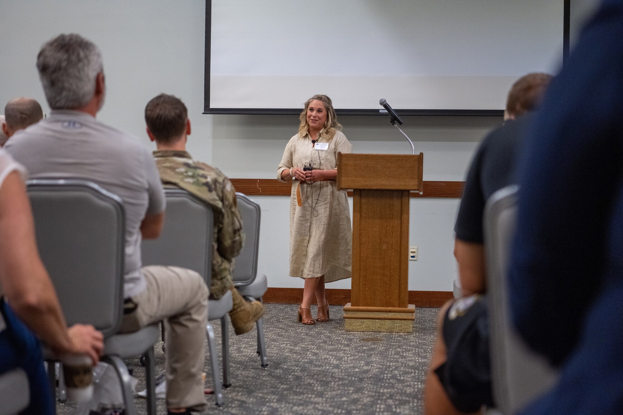 Natasha Hilts, Integrated Resiliency Optimization Network (IRON) Summit coordinator, gives opening remarks during the IRON Summit at Hurlburt Field, Florida on July 18, 2023.