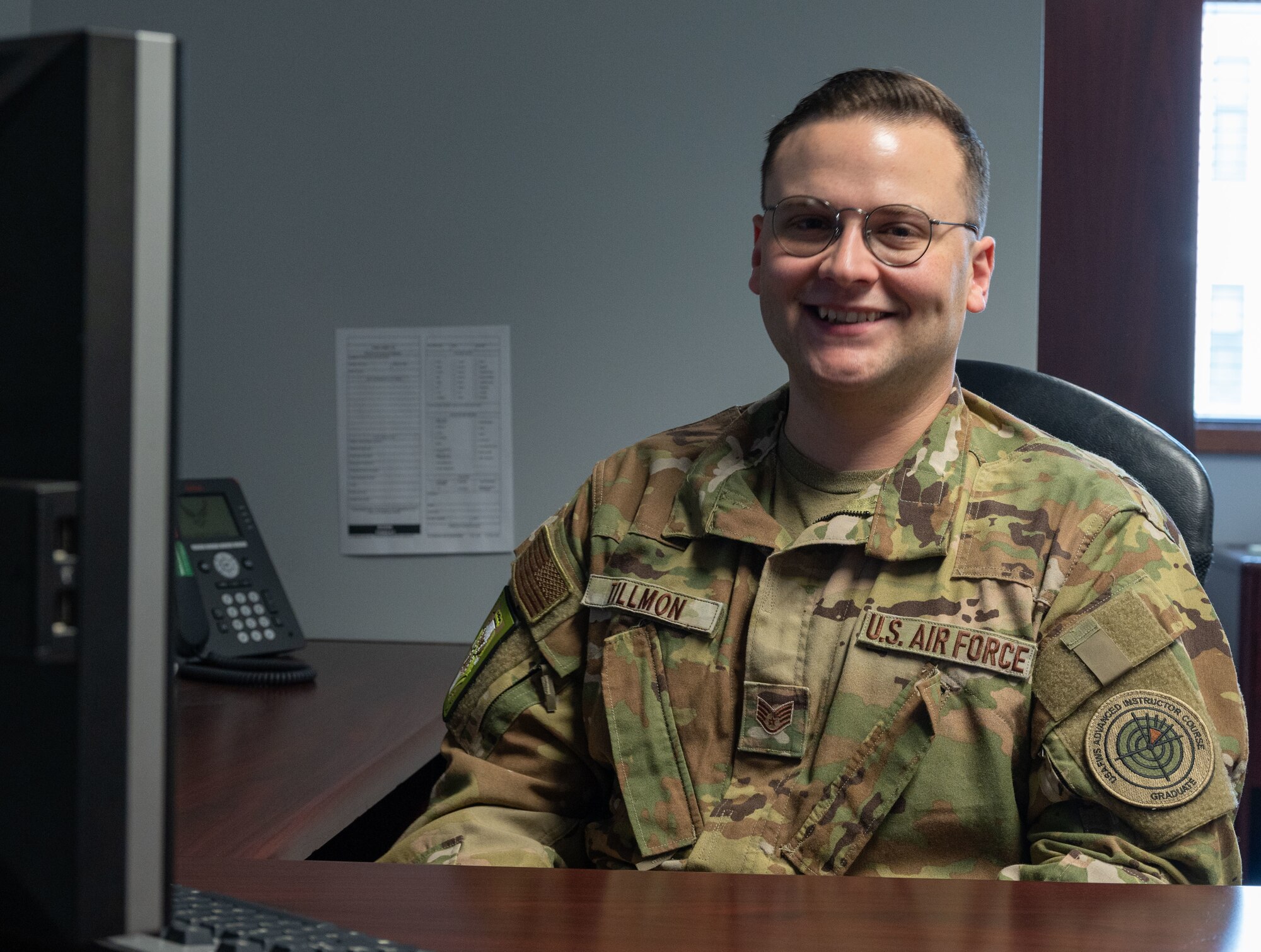 Staff Sgt. Jonathan Tillmon, 3rd Airlift Squadron C-17 Globemaster III loadmaster, poses for a photo at Dover Air Force Base, Delaware, July 14, 2023. Tillmon recently became the first enlisted member at Dover AFB to graduate from the U.S. Air Force Weapons School, which trains system experts, weapons instructors, advanced iInstructors and leaders of Airmen to exploit air, space and cyberspace on behalf of the joint force. (U.S. Air Force photo by Airman 1st Class Dieondiere Jefferies)