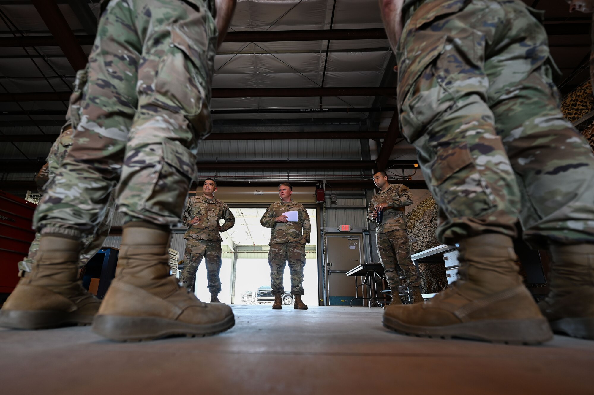 U.S. Air Force Chief Master Sgt. William Cupp, 350th Spectrum Warfare Wing command chief, meets Airmen from the 36th Electronic Warfare Squadron at Eglin Air Force Base, Fla., July 31, 2023. Cupp serves as the principal advisor to the wing commander and senior staff on matters affecting the professional development and effective utilization of 1,500 military and civilian personnel. (U.S. Air Force photo by Staff Sgt. Ericka A. Woolever)