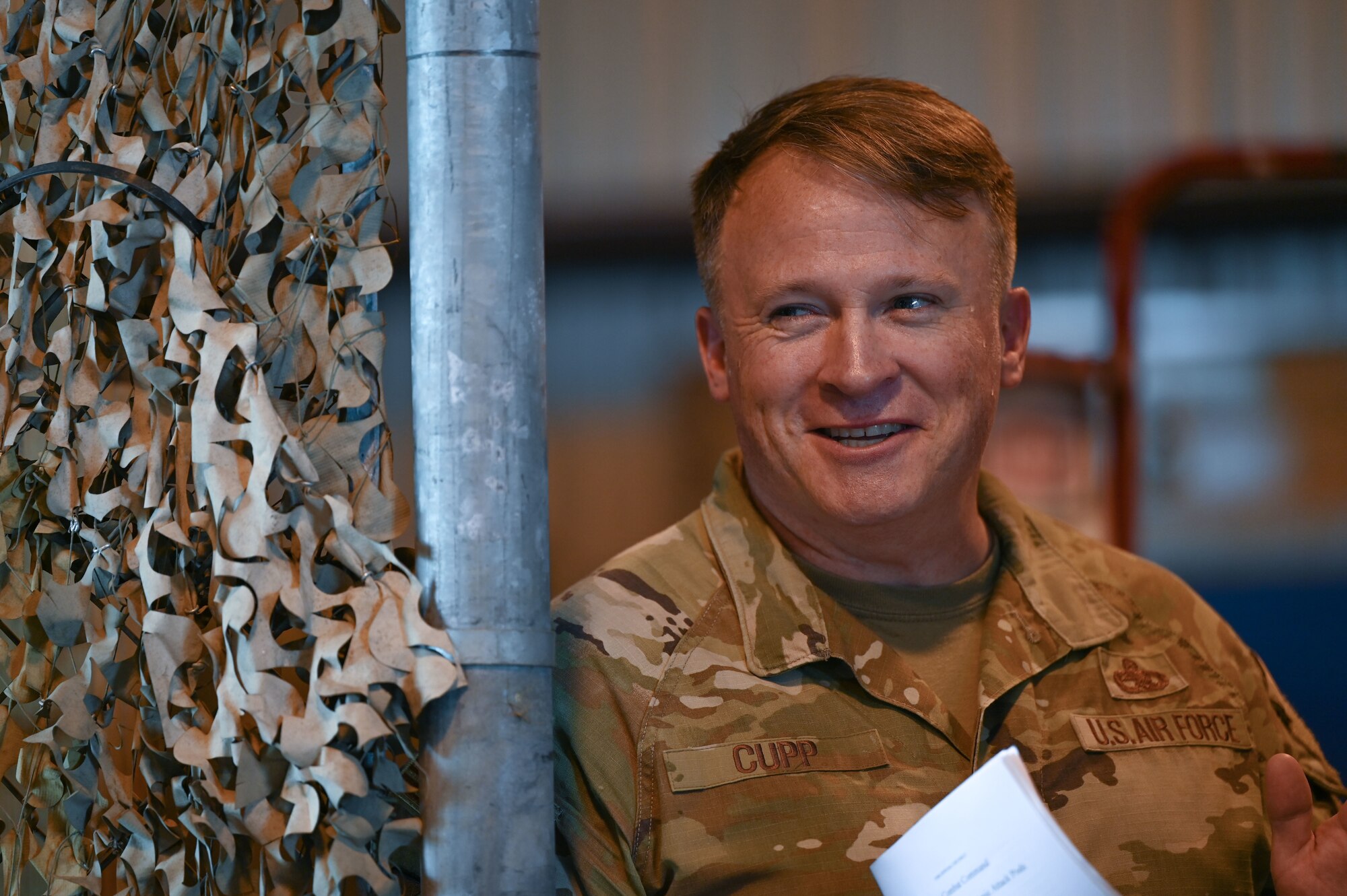 U.S. Air Force Chief Master Sgt. William Cupp, 350th Spectrum Warfare Wing command chief, talks to Airmen from the 36th Electronic Warfare Squadron at Eglin Air Force Base, Fla., July 31, 2023. The 350th Spectrum Warfare Wing’s primary mission is to provide rapid combat power to commanders during peacetime, through crisis, and in war. The wing specializes in rapid reprogramming of electronic warfare systems to scan, sense, identify, locate, counter, and survive against hostile threats. (U.S. Air Force photo by Staff Sgt. Ericka A. Woolever)