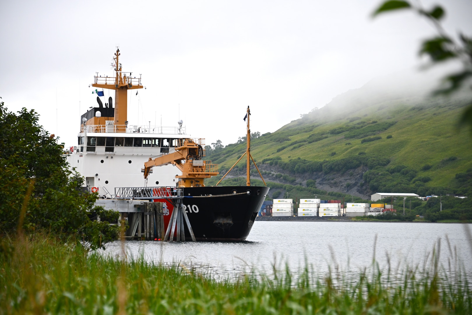 Coast Guard Cutter Cypress sits moored to a pier on Base Kodiak in Womens Bay, Alaska, on Aug. 11, 2022. The Cypress crew fills the role as the “Aleutian Keeper” and are responsible for servicing aids to navigation throughout Kodiak and the Aleutian Chain. U.S. Coast Guard photo by Petty Officer 3rd Class Ian Gray.