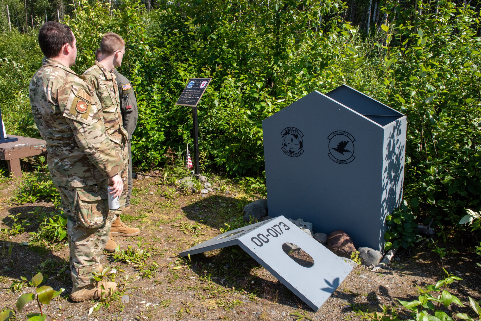 Airmen assigned to the Alaska Air National Guard’s 249th Airlift Squadron, 144th Airlift Squadron and the U.S. Air Force 517th Airlift Squadron read the memorial at the crash site of “Sitka 43” as they gather to do a final roll call and a toast on Joint Base Elmendorf-Richardson, Alaska.