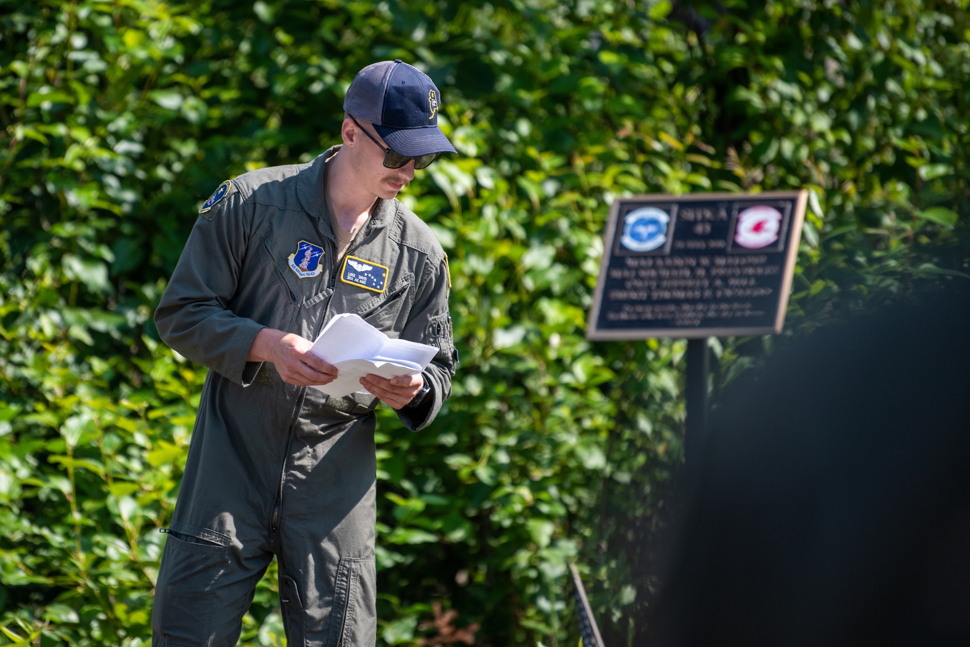 Alaska Air National Guardsman SrA Luke Davis, assigned to the 144th Airlift Squadron, conducts a memorial ceremony at the crash site of “Sitka 43” at Joint Base Elmendorf-Richardson, Alaska.