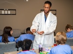 Hospitalman R’Jai Johnson, from clinical lab sciences, explains needle safety and the breadth of phlebotomy to elementary school students from Starbase Victory MedBase summer camp July 26 at Naval Medical Center Portsmouth (NMCP). The tour was part of an effort by the school district to expose children to the world of STEM. (U.S. Navy photo by Mass Communication Specialist 2nd Class Dylan M. Kinee)