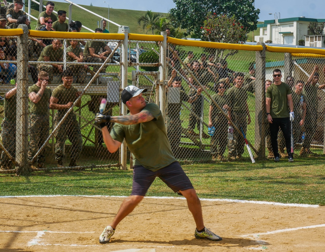U.S. Marine Corps Capt. Brandon Grzyb, a platoon commander with Combat Logistic Regiment 37, participates in a softball game against the Japanese Ground Self-Defense Force during a field meet at Camp Kinser, Okinawa, Japan, April 28, 2023. The purpose of the field meet was to boost morale and build esprit de corps and unit cohesion amongst the Marines. (U.S. Marine Corps photo by Cpl. Chancellor Reynolds.)