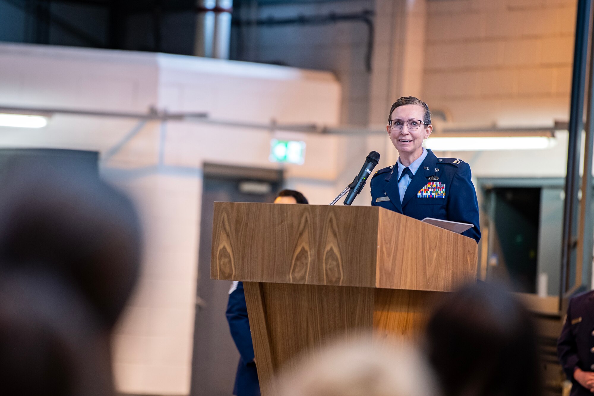 U.S. Air Force Col. Valerie Long, 423d Air Base Group commander, speaks during the 423d Medical Squadron change of command ceremony at RAF Alconbury, England, May 30, 2023. During the ceremony, Lt. Col. Darrell Lee relinquished command of the 423d MDS to Lt. Col. Yvonne Storey. (U.S. Air Force photo by Staff Sgt. Eugene Oliver)