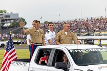 Members of the Armed Forces participate in the opening ceremony of the Indy 500 at the Indianapolis Motor Speedway May 28, 2023. Throughout the two weeks leading up to the Indianapolis 500, multiple events take place to honor military service members and their families. (U.S. Marine Corps photo by Sgt. Ethan M. LeBlanc)