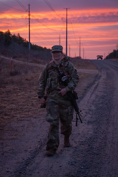 U.S. Air Force Tech. Sgt. Jessica Gallis, equipment manager with the 104th Logistics Readiness Squadron, competes in the 2023 Massachusetts National Guard Best Warrior Competition's land navigation event March 25, 2023 at Joint-Base Cape Cod, Massachusetts. The three-day competition covered areas of expertise to include physical fitness, weapons proficiency, land navigation, and first aid. (U.S. Air National Guard courtesy photo)